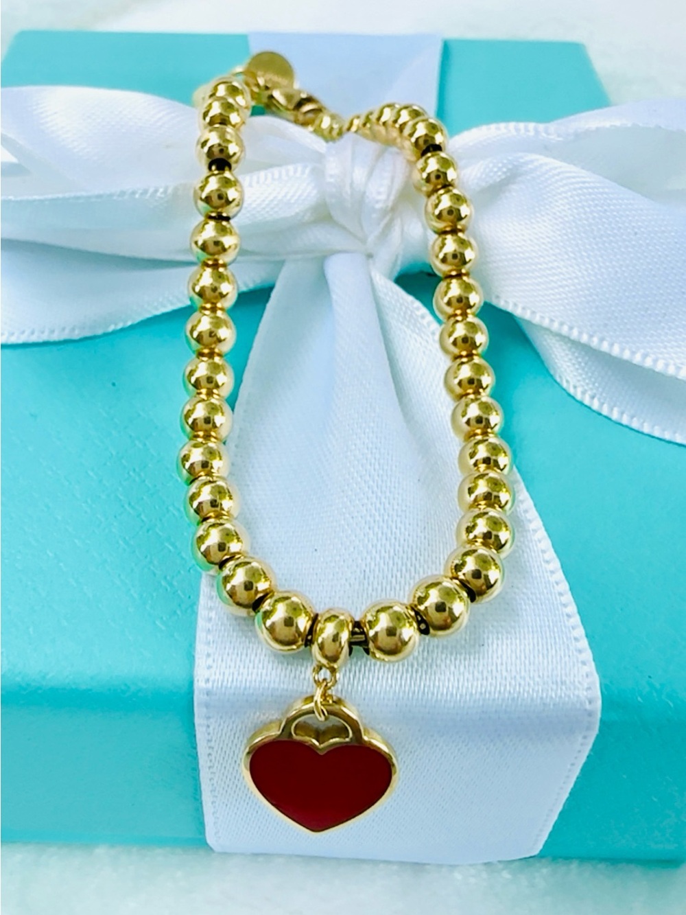 Tiffany & Co. Gold Beaded Bracelet with Red Enamel Heart Charm